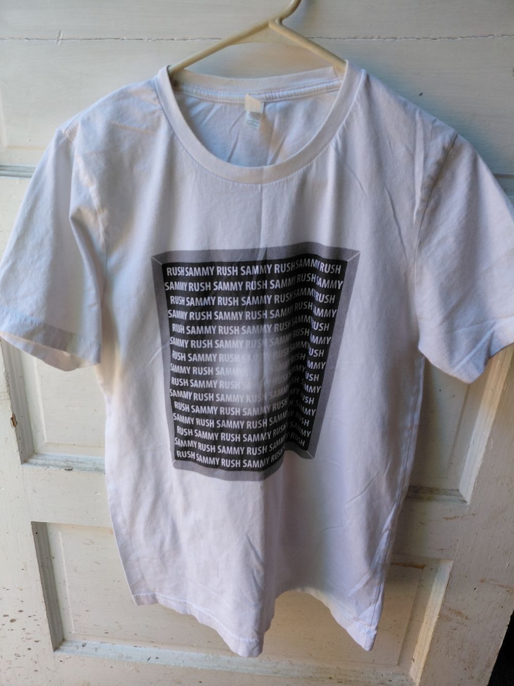 White Graphic SAMMY RUSH Tee with Black Repeated Text Panel